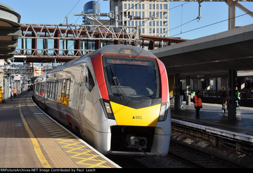 Inbound EMU's approach stop on a watchful eye